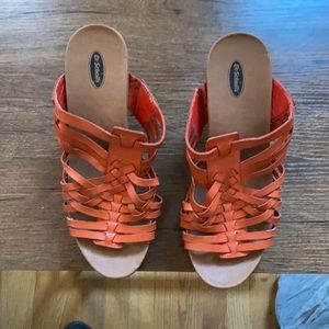 Orange slip on sandals